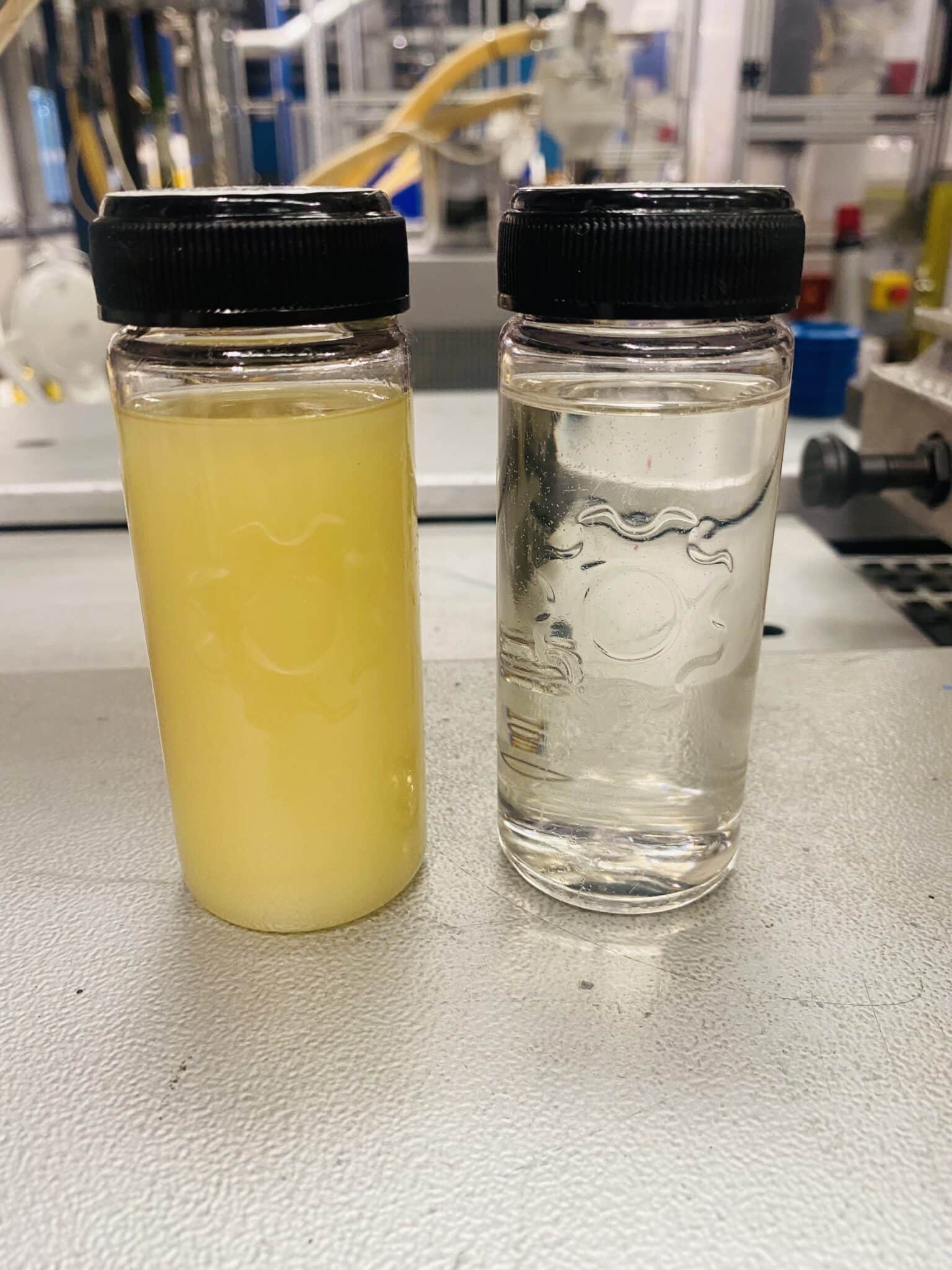 Removal of water from oil with filters and system flushing
